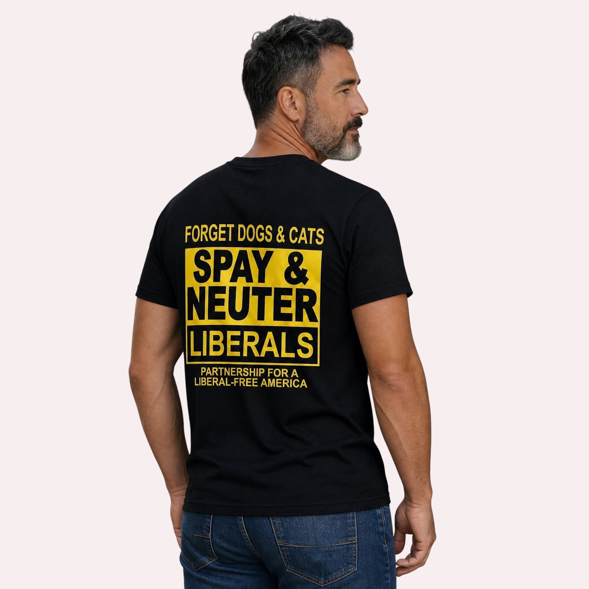 TrendyShift.Com black t-shirt with yellow text reading Spay & Neuter Liberals on the back, worn by a man.