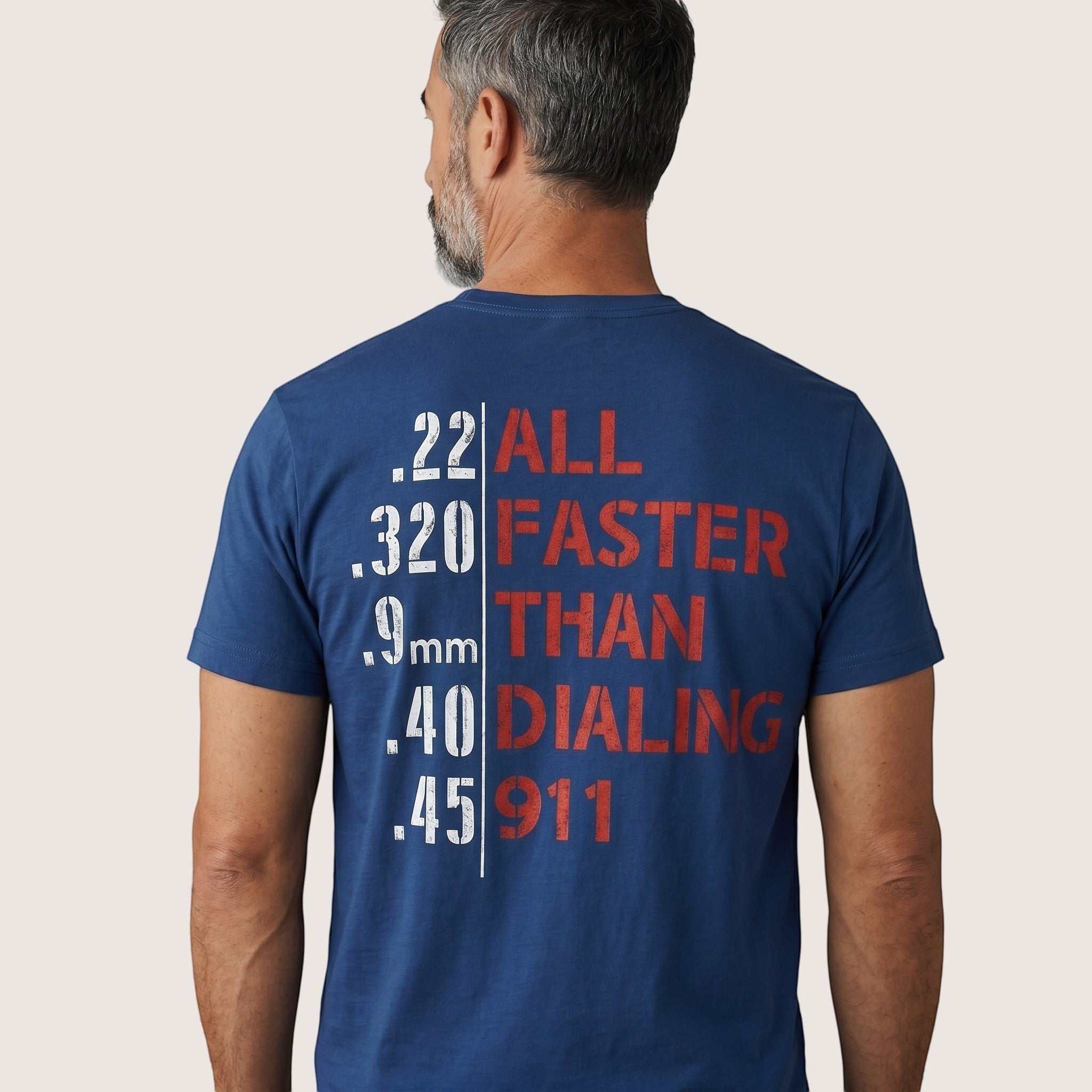 TrendyShift.Com blue unisex t-shirt featuring a back graphic with firearm calibers and All Faster Than Dialing 911 text