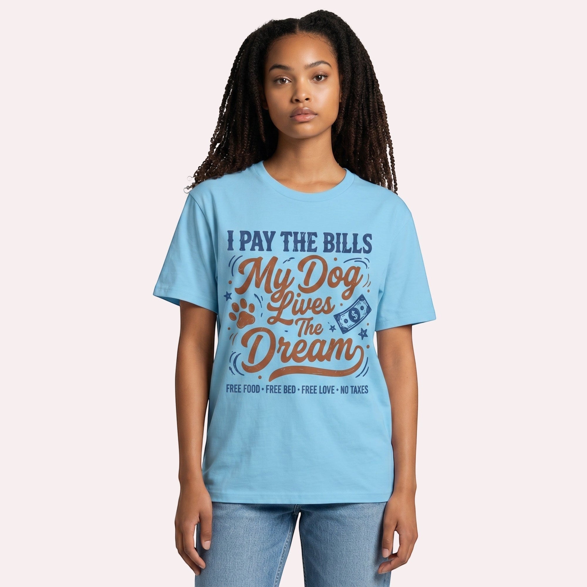 TrendyShift.Com light blue cotton graphic t-shirt with I Pay The Bills My Dog Lives The Dream text on a model
