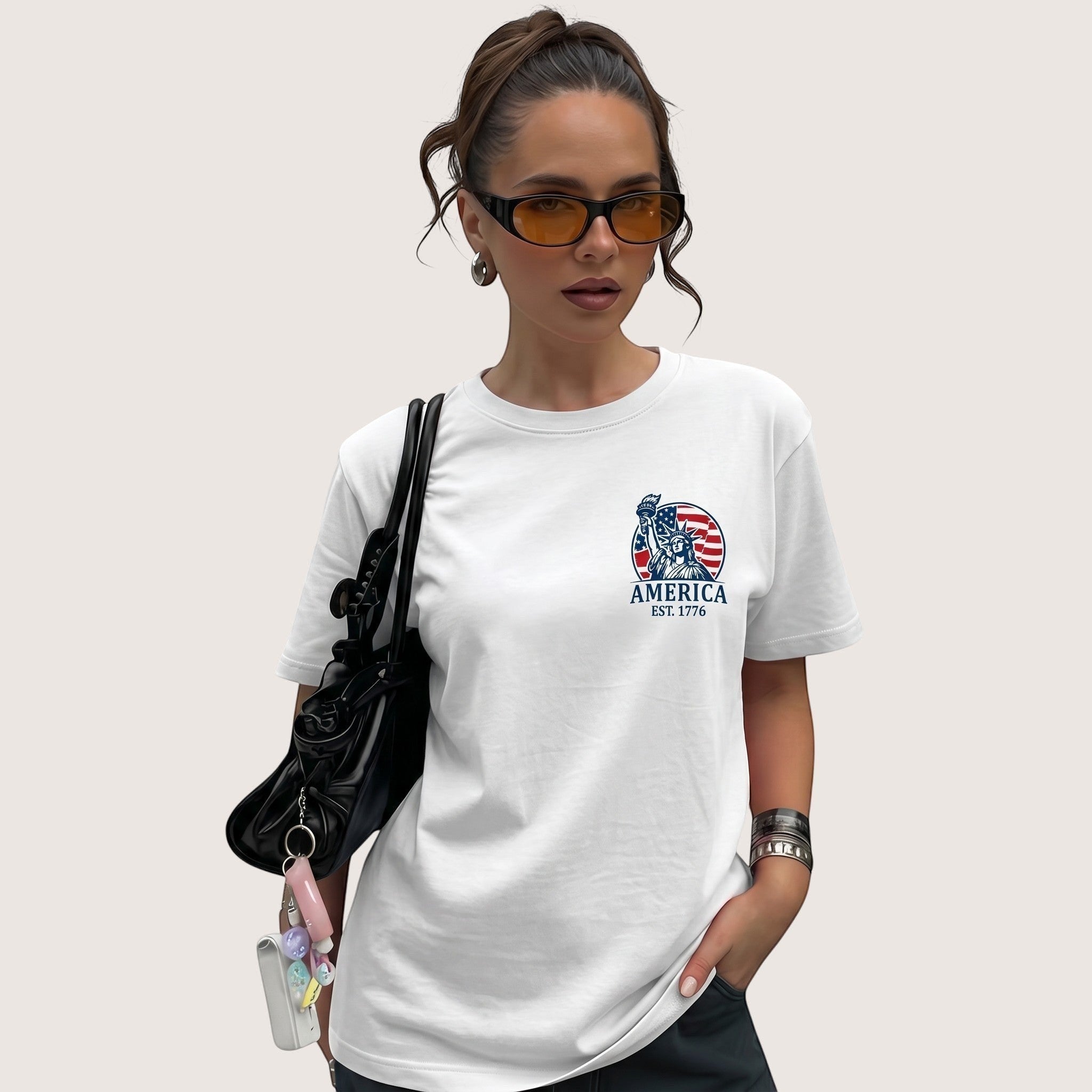 TrendyShift.Com white cotton unisex t-shirt featuring a Statue of Liberty and American flag graphic for 250th anniversary